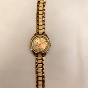 Rose gold and gold watch